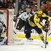 Michigan senior center Kevin Lynch makes a move behind the net in the game against Michigan State at Joe Louis Arena on Saturday, Feb. 2. Daniel Brenner I AnnArbor.com